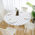 nappe-ronde-blanche-a-carreaux